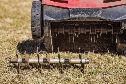 lawn-care-old-grass-removal-soil-aeration-with-scarifier_original